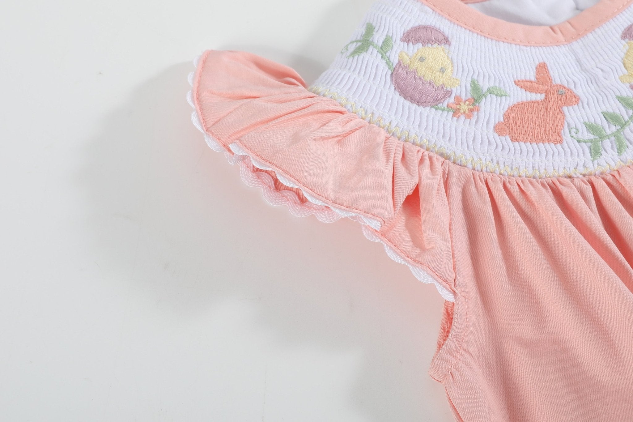Light Pink Smocked Flutter Romper