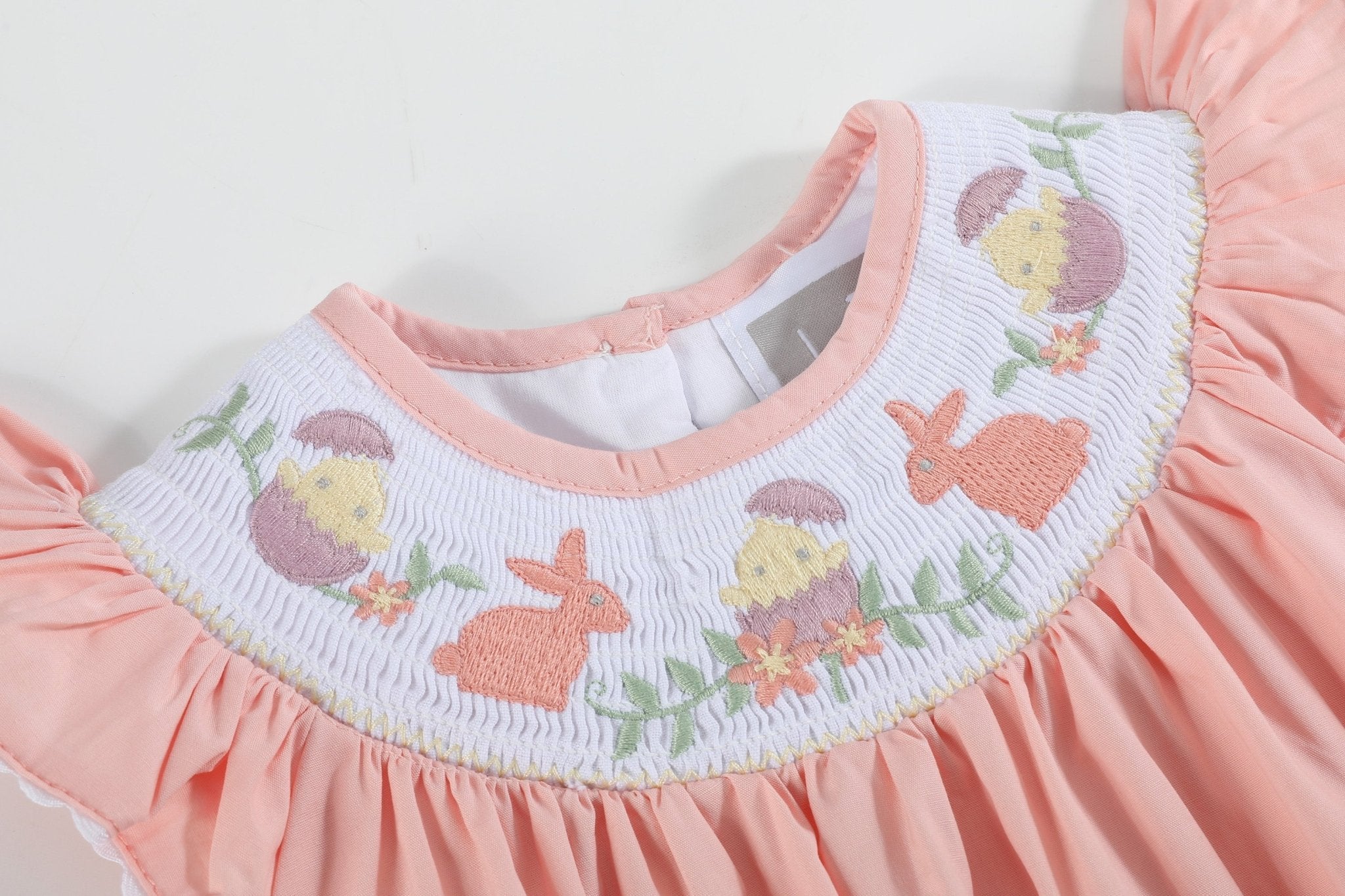 Light Pink Smocked Flutter Romper