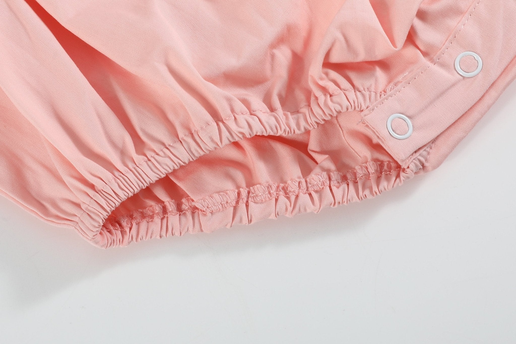 Light Pink Smocked Flutter Romper